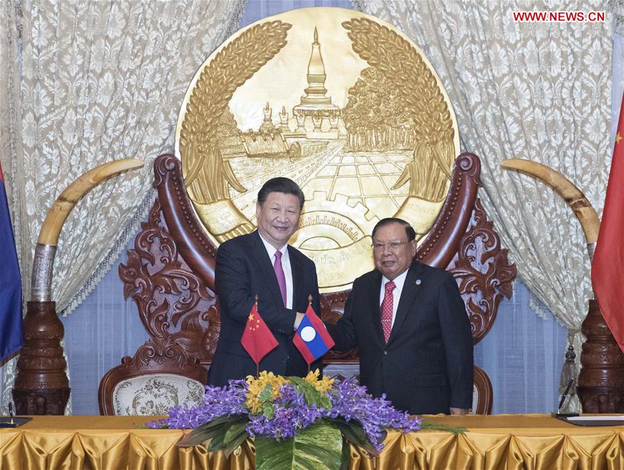 LAOS-CHINA-XI JINPING-BOUNNHANG VORACHIT-TALKS