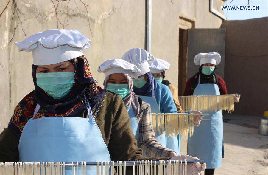 AFGHANISTAN-MAZAR-I-SHARIF-NOODLE FACTORY-WOMEN