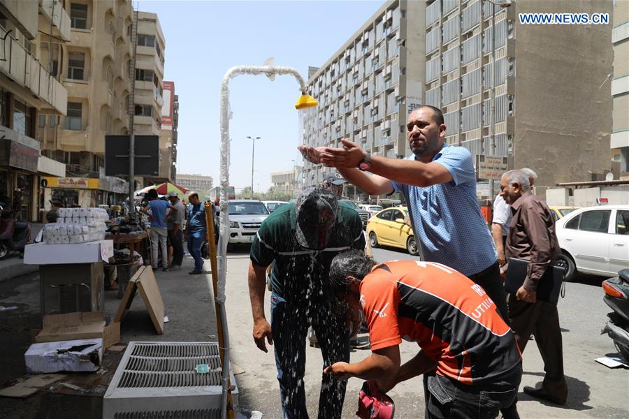 IRAQ-BAGHDAD-WEATHER-HEAT