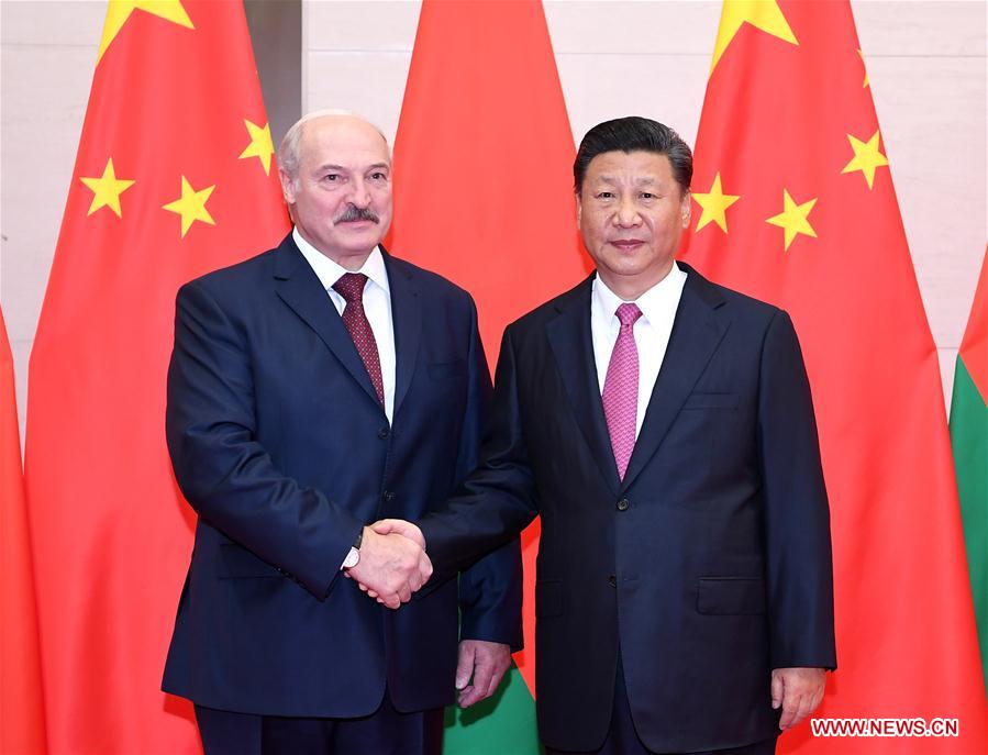 (SCO SUMMIT) CHINA-QINGDAO-XI JINPING-BELARUS-ALEXANDER LUKASHENKO-MEETING (CN)