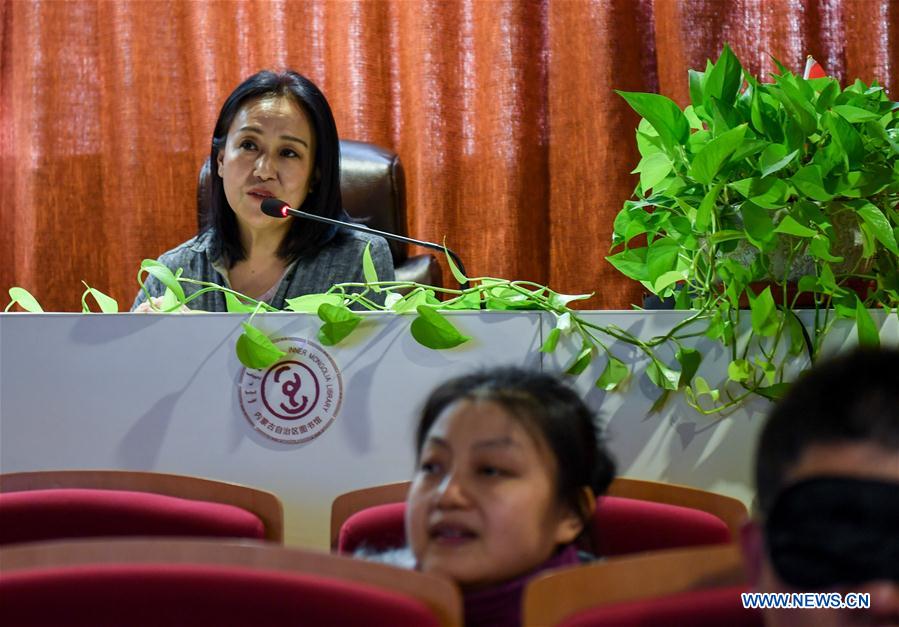 CHINA-INNER MONGOLIA-HOHHOT-VISUALLY IMPAIRED-CINEMA-POEM-VOLUNTEER (CN)