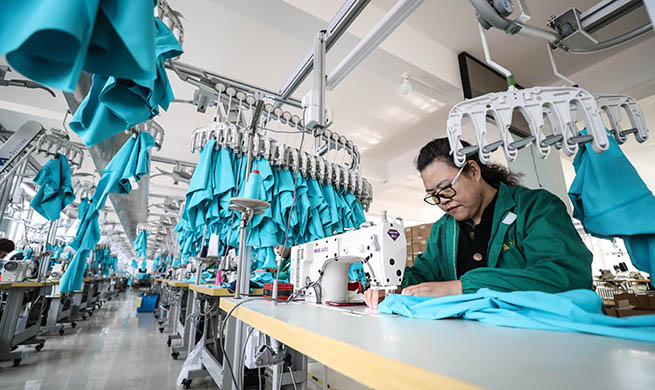 Xinhua Headlines: Bikinis, guitars and glasses...How China's small towns meet global demand