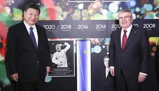 Chinese president meets IOC president, pledges to make 2022 Winter Olympics an excellent 
event