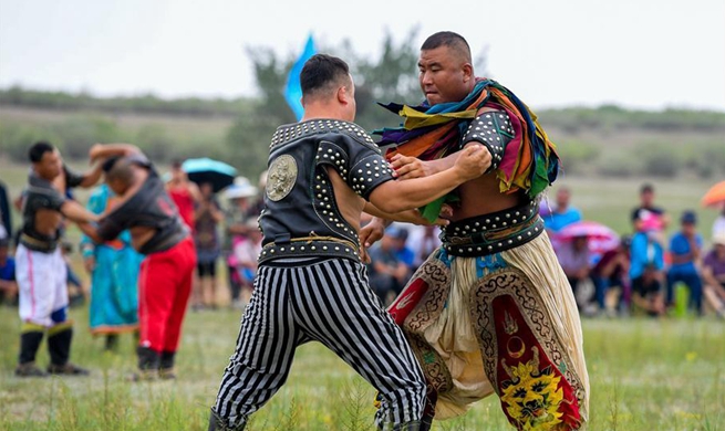 People take part in Nadam Fair in north China's Inner Mongolia