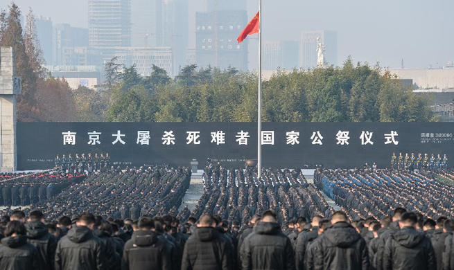 Xinhua Headlines: China observes national memorial day with praying for peace