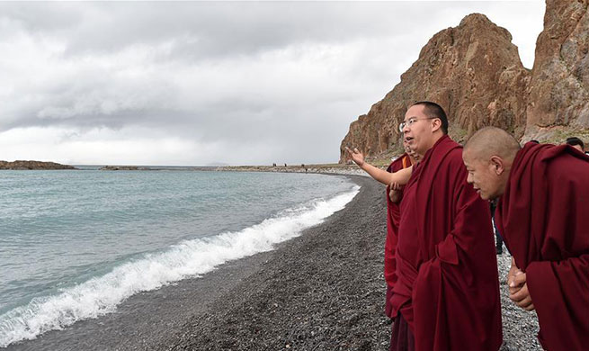 11th Panchen Lama worships on bank of Nam Co Lake in China's Tibet