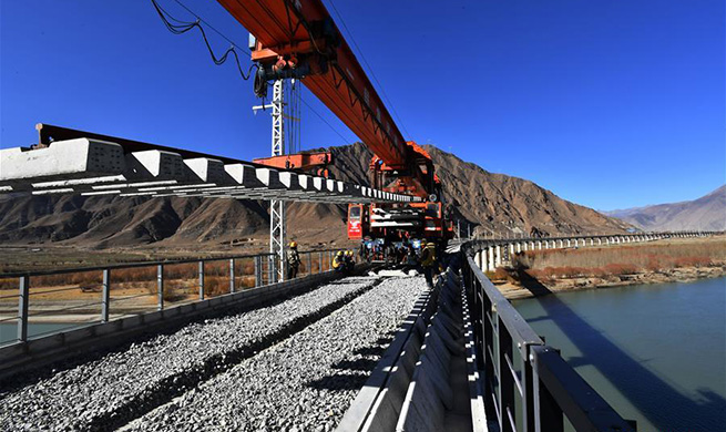 Rail-laying work for 4,615-meter-long bridge crossing Yarlung Zangbo River completed