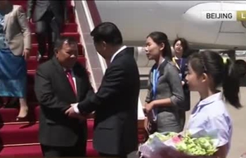 Laos president arrives in Beijing for Belt and Road Forum